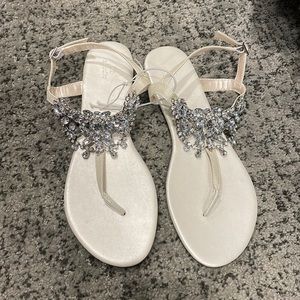 Never worn sandals. Would be perfect for any bridal events!